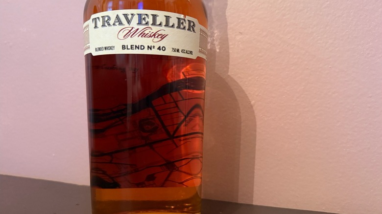 close up of the hidden map on the bottle of Traveller Whiskey
