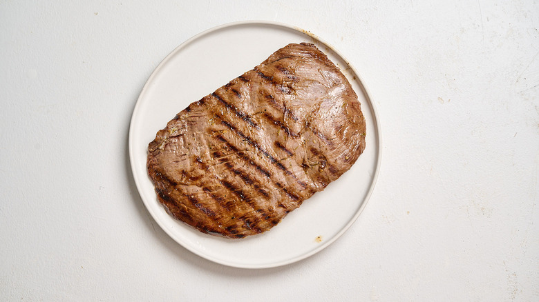 steak resting on a plate