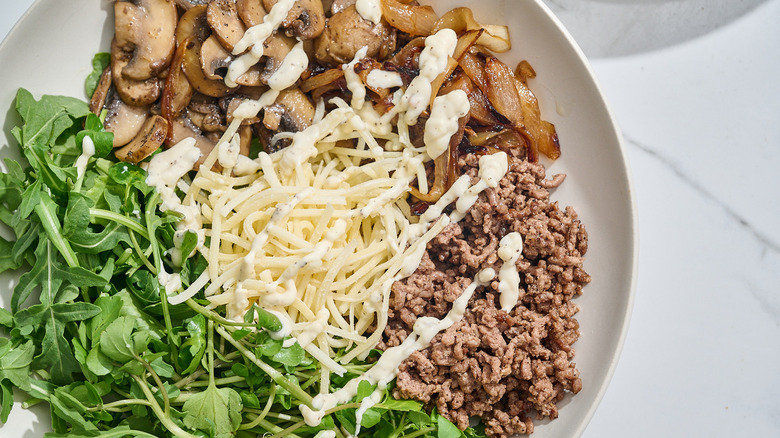 close up of burger bowl on a table