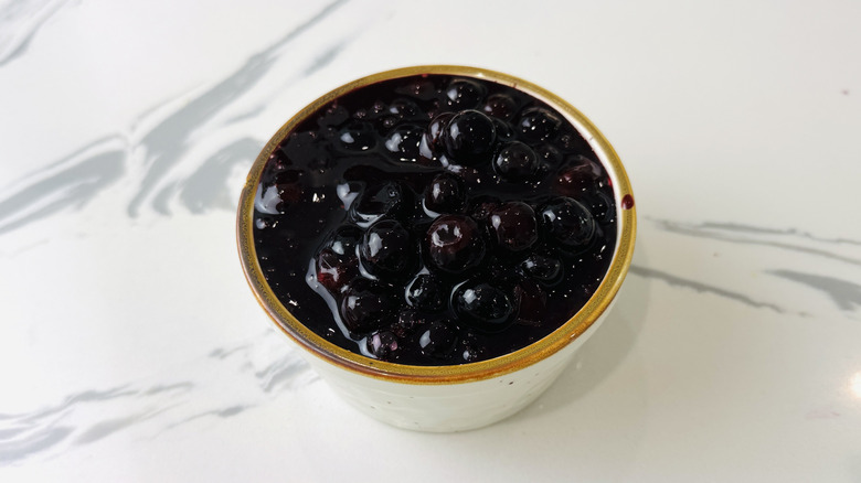 Blueberry cheesecake topping in ramekin