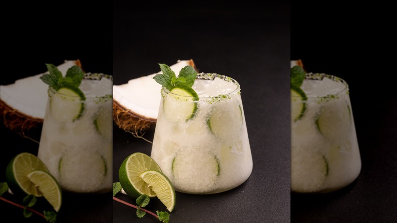 Limonada de coco in glass with sprig of mint