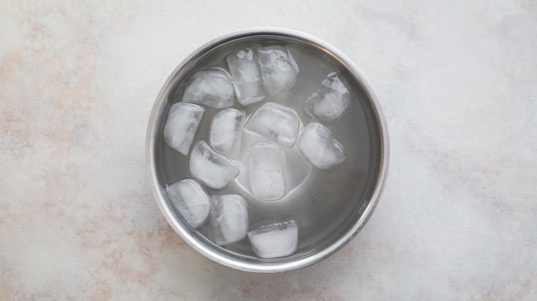 ice water in metal bowl