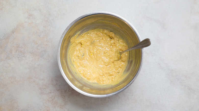 mashed egg yolks in bowl