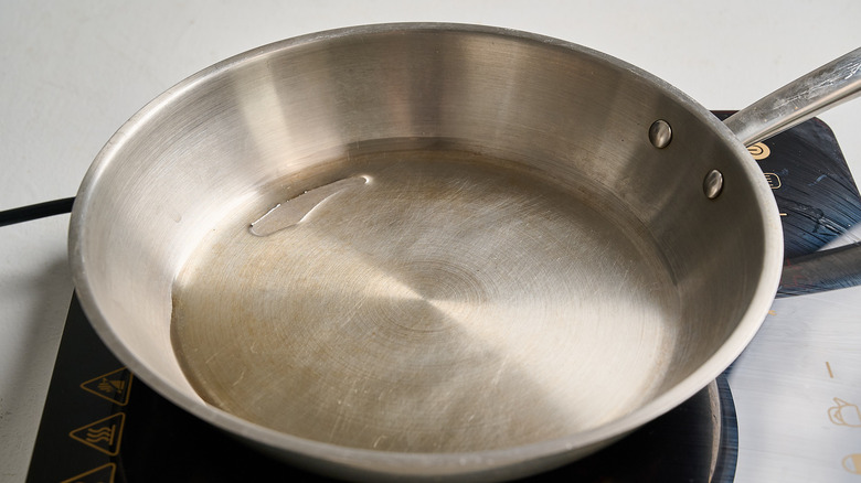 heating a skillet over medium heat