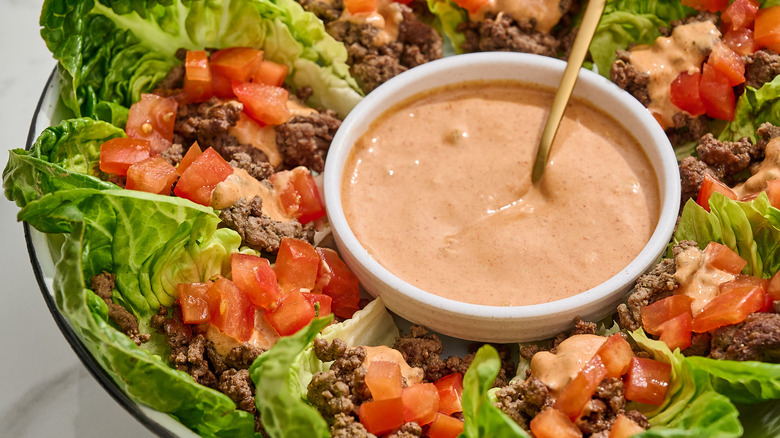 burger lettuce wraps in a bowl with burger sauce
