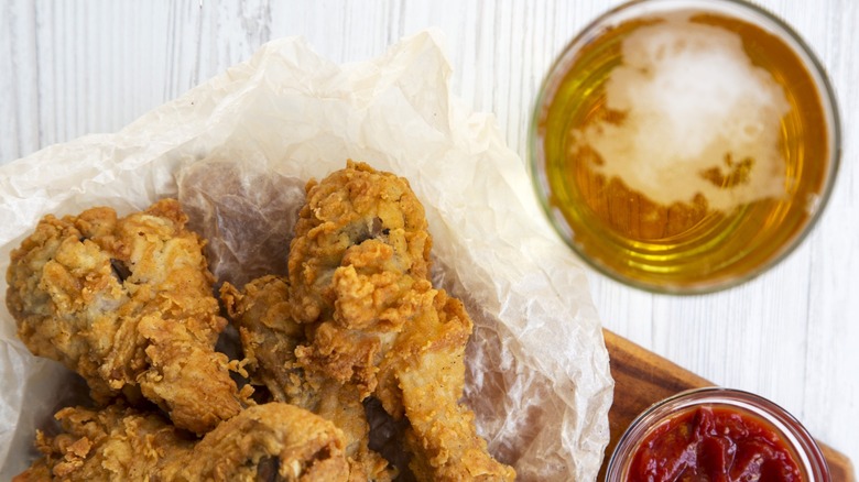 plate of fried chicken and beer