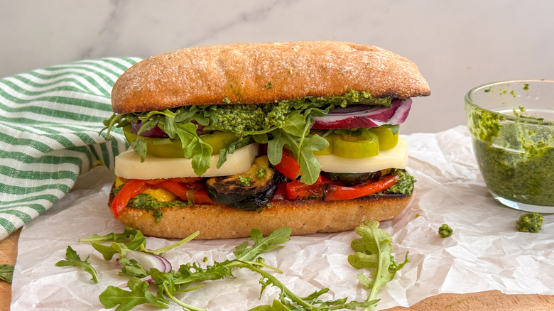 grilled veggie sandwich with arugula and pesto