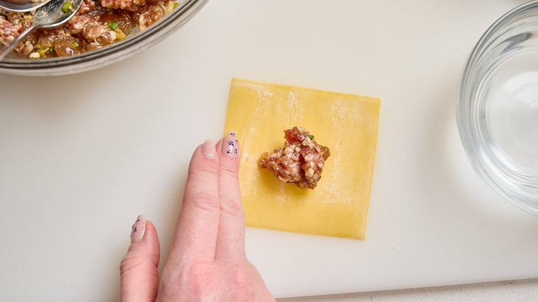 lining wonton wrapper with water