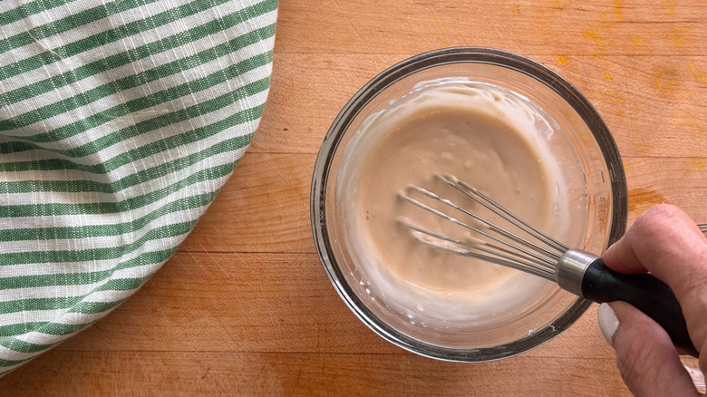hand whisking sauce