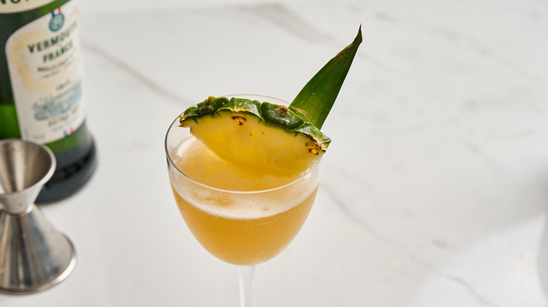 cocktail garnished with pineapple