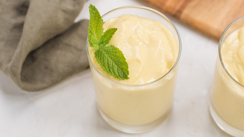 Mango lassi garnished with mint