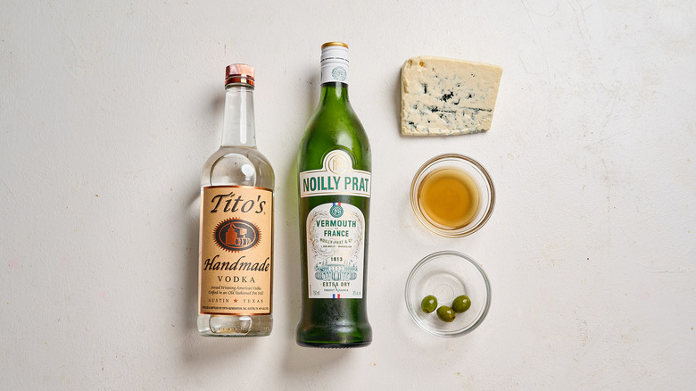 Blue cheese martini ingredients on a table