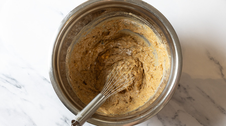 Raw banana bread batter in bowl.