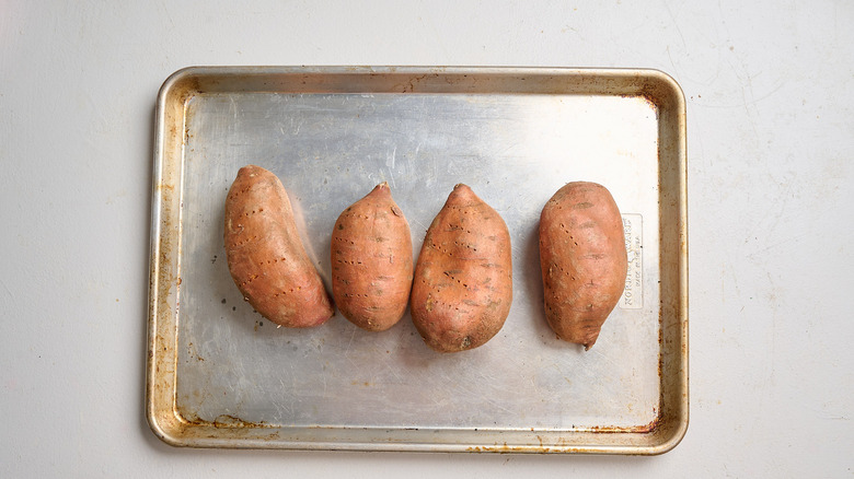 sweet potatoes on a baking sheet