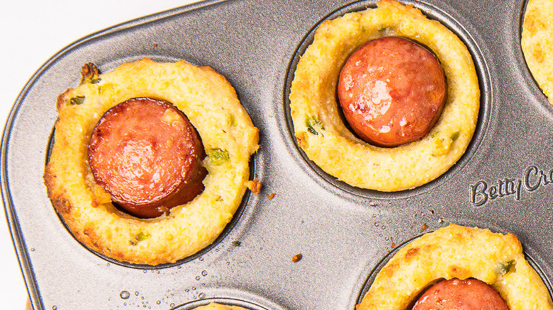Spicy mini corn dog muffins in tin.