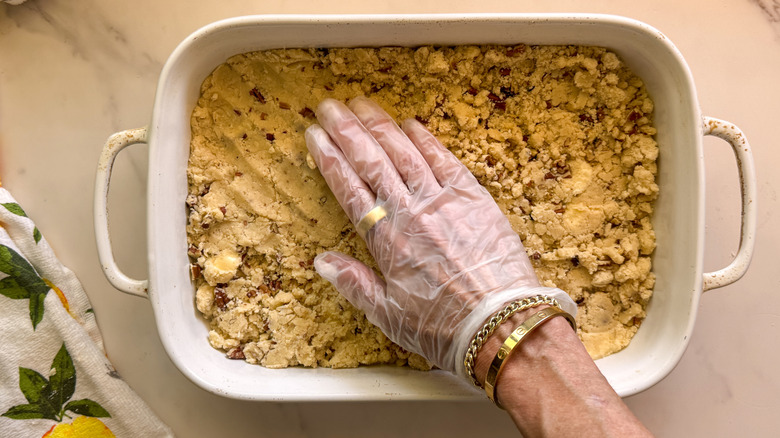hand pressing in crust