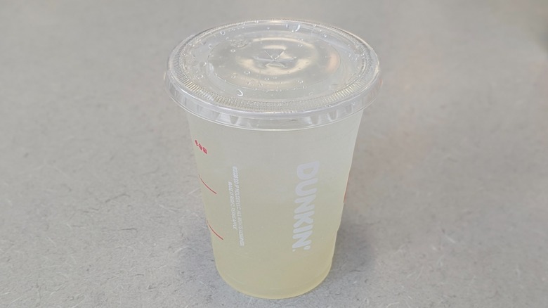 A Sparkling Lemonade from Dunkin' on a grey table