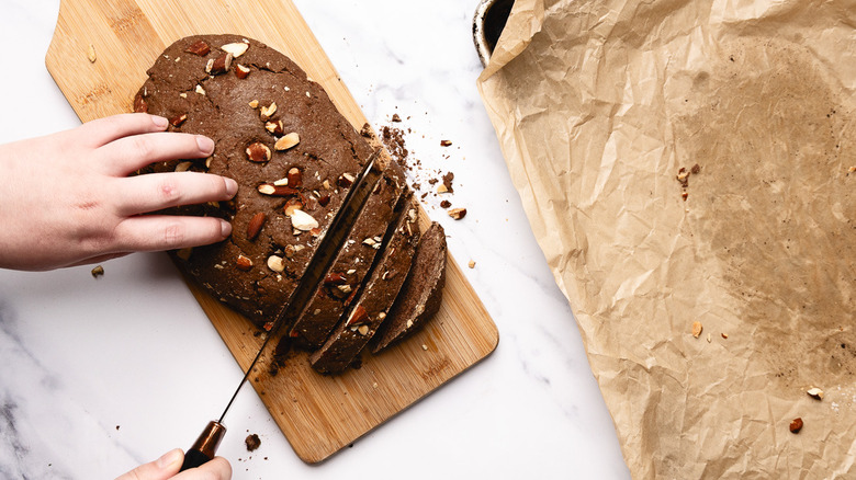 Slicing biscotti log.