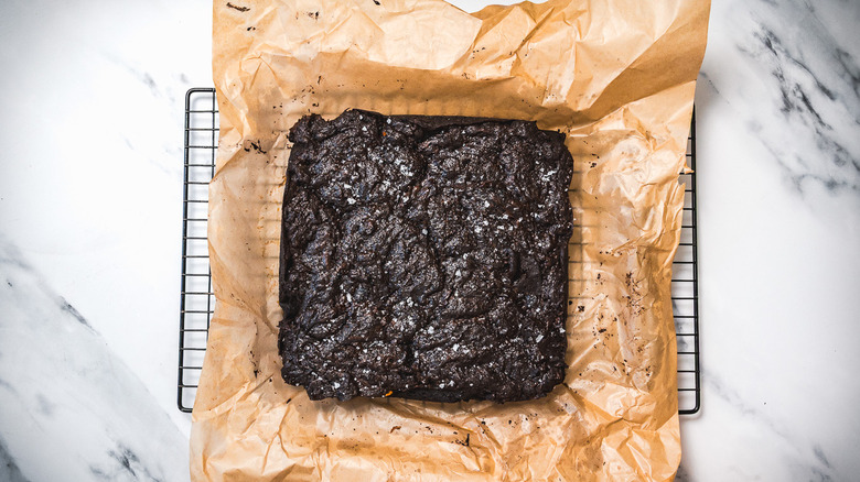 Brownies on parchment paper.'/><br />
                    </source></source></picture>
</p></div>
<div class=