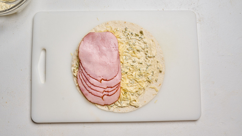 ham layered on top of mayo and cheese