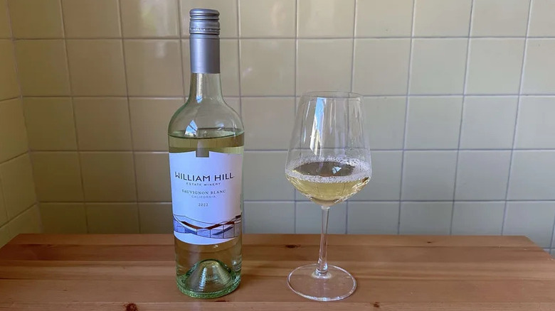 Glass of William Hill Sauvignon Blanc on wooden table