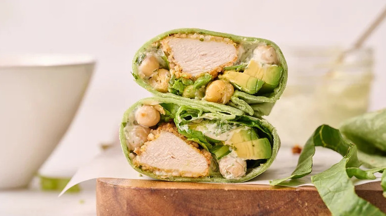 Green Goddess Air-Fried Chicken Wrap stacked on wooden board