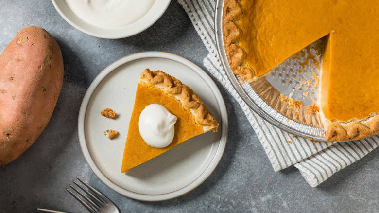 Slice of sweet potato pie next to the vegetable