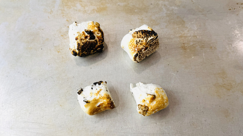 Toasted marshmallows on baking sheet