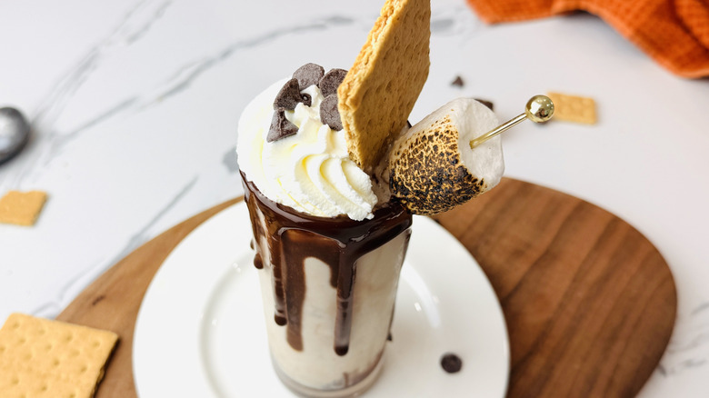 S'mores milkshake served on plate with garnishes