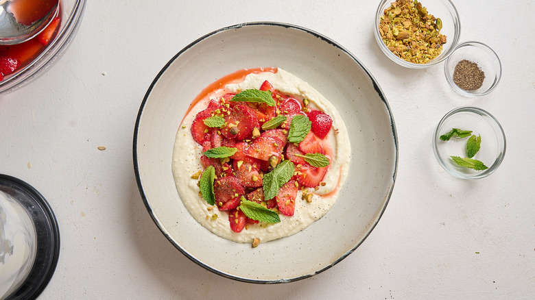 strawberries and whipped feta topped with pistachio