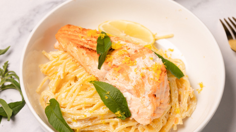 A bowl of creamy citrusy salmon pasta.