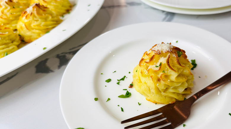 Duchess potato serving on plate