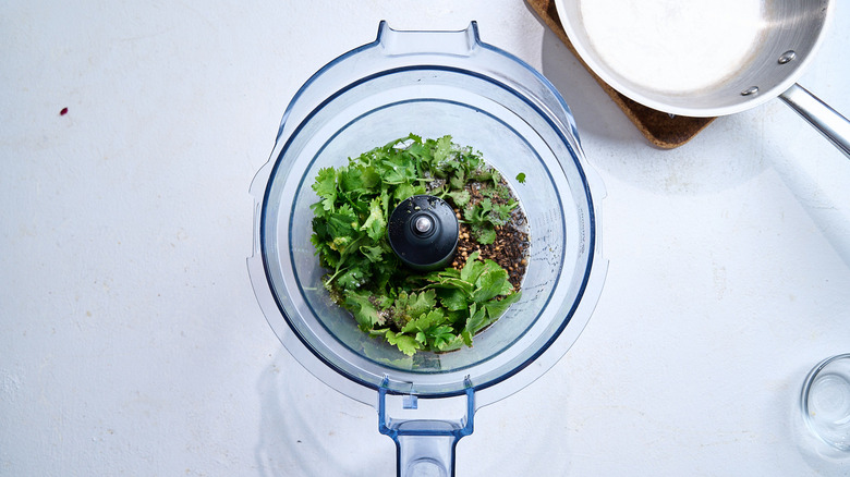 zhug ingredients in a food processor