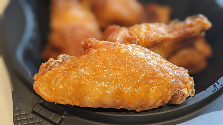 A pile of Pizza Hut wings