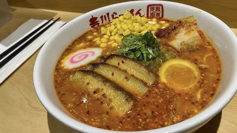 Ramen with corn, soft-boiled egg, and green onions
