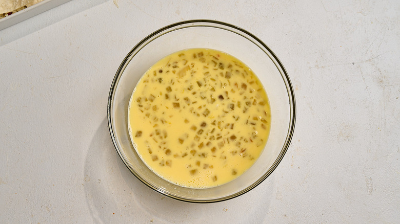 chiles stirred into the egg mixture