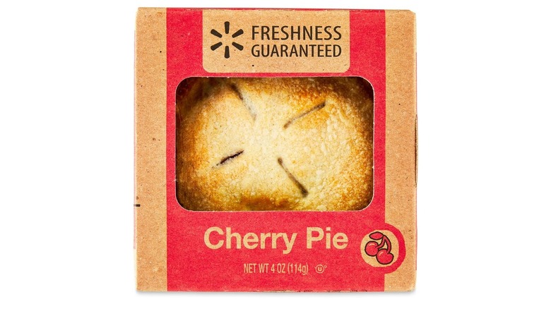 A Walmart mini cherry pie in a cardboard box