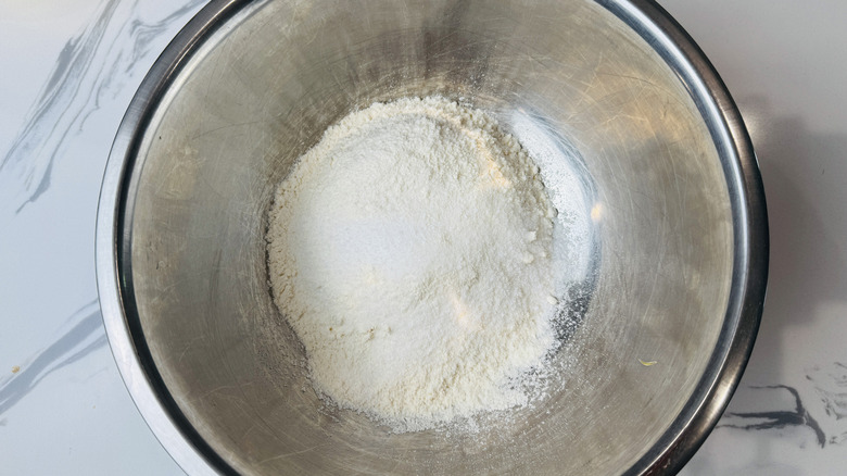 Flour, salt, and sugar in a bowl