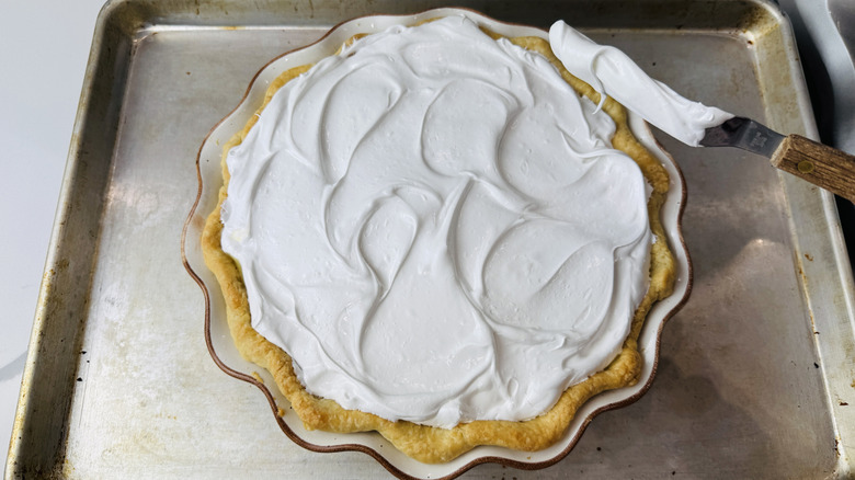 Meringue swooped over raisin pie