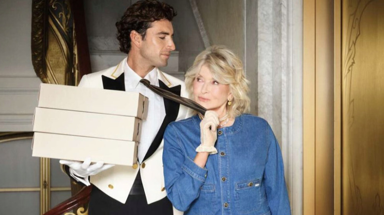 Martha posing with a man for the MOTHER collaboration