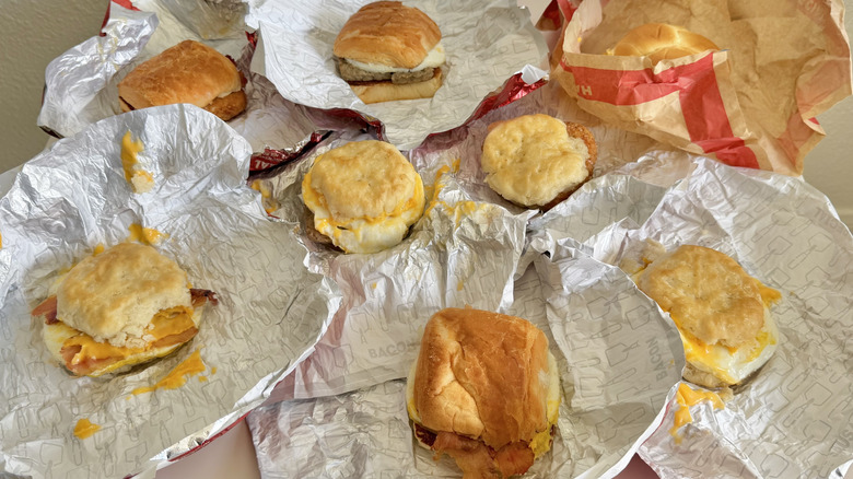 Different Wendy's sandwiches on a table