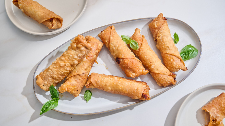 serving egg rolls on a platter