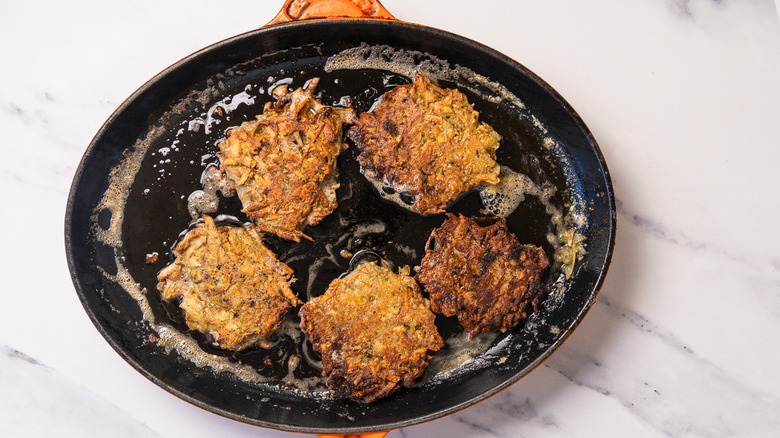 Cooked rosti in pan