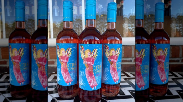three bottles of rose moscato
