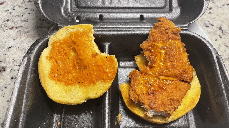 Zaxbys chicken sandwich in a black container