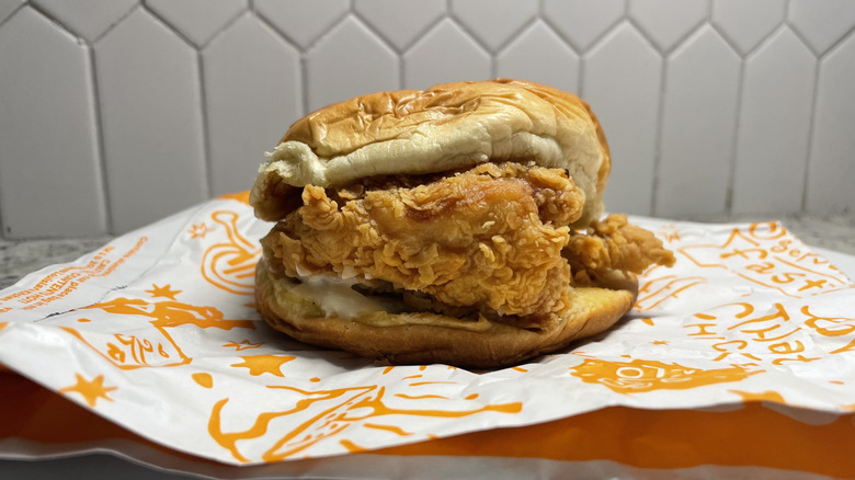 Popeye's fried chicken sandwich on a plate