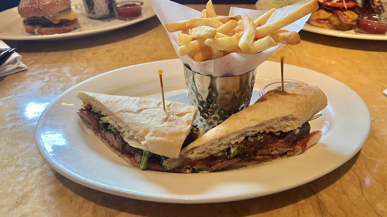 Cheesecake Factory Bistro Burger and fries on plate.