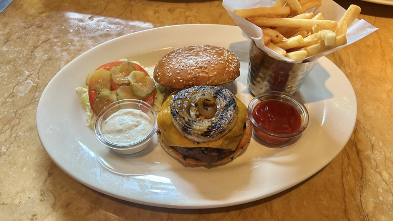 Cheesecake Factory Classic Burger and fries on plate.