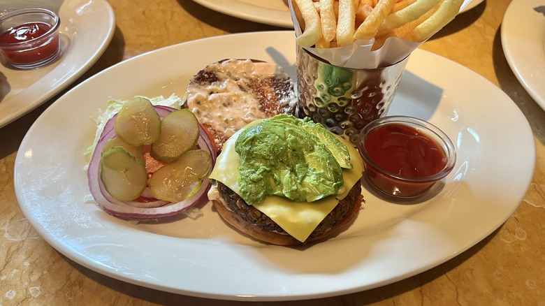 Cheesecake Factory Veggie Burger and fries on plate.