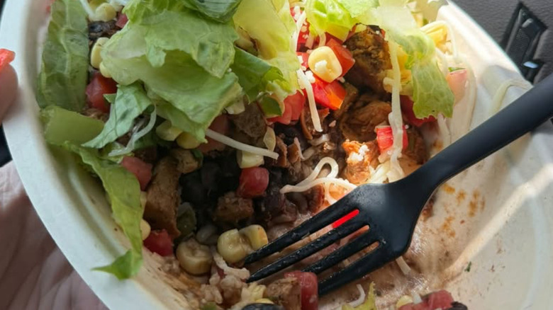 close up of a half-eaten Chipotle Double High Protein Bowl